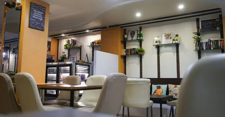 Café corner with book shelves